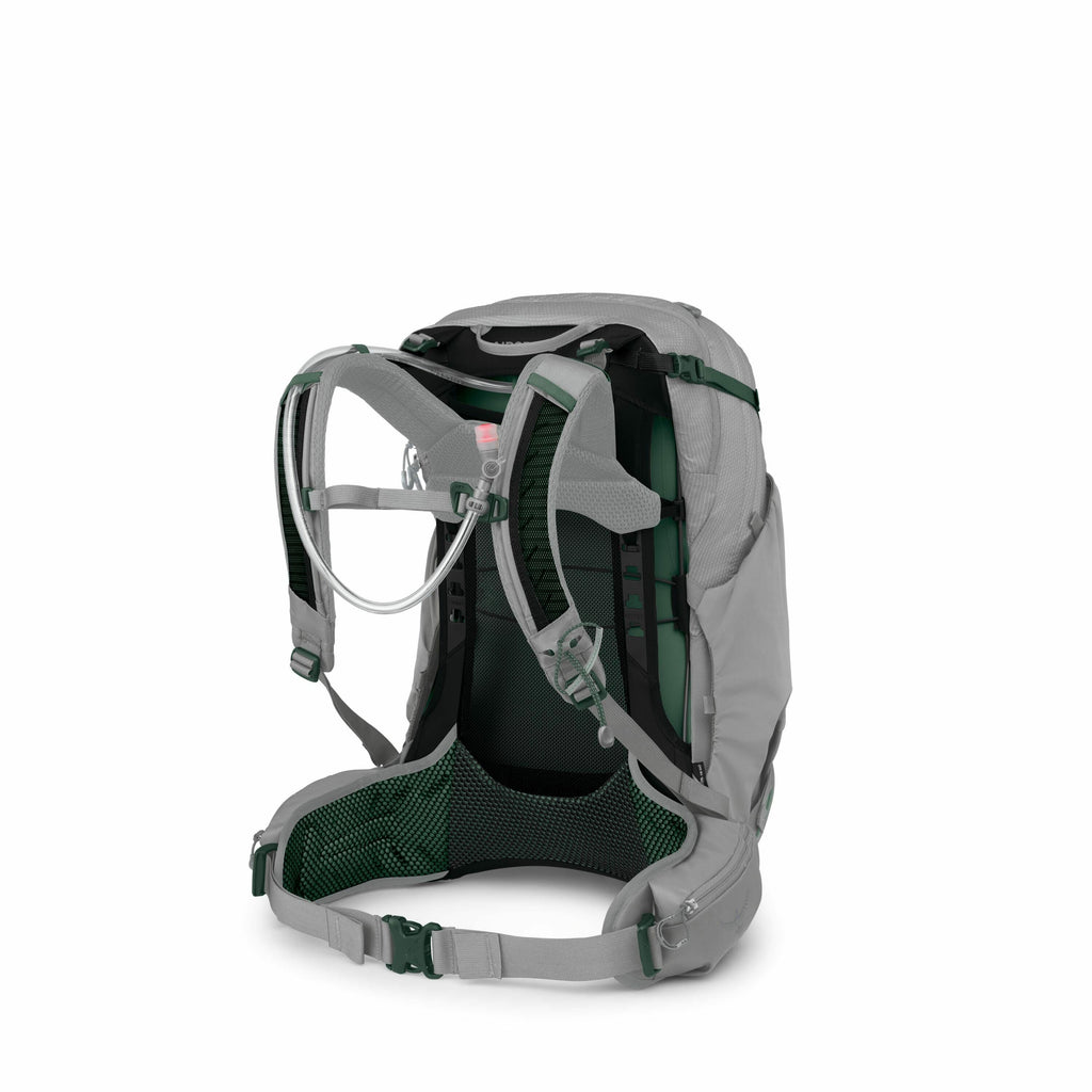 The image displays a gray and green backpack designed for outdoor activities. The backpack features padded shoulder straps, a hip belt with a buckle, and an adjustable sternum strap, suggesting a focus on comfort and weight distribution. It has a mesh bac