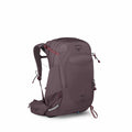 The image showcases an Osprey Mira 24 backpack, designed for outdoor activities such as hiking or trekking. The backpack is a muted purple color with darker shades on the shoulder straps and back padding. The design features multiple compartments with zip