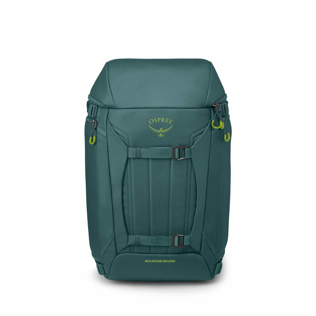 The image features a backpack designed for outdoor activities, particularly hiking or mountaineering. It is an Osprey branded pack, primarily in a dark green color, with bright yellow accents on the logo and some clips or attachment points. The backpack h