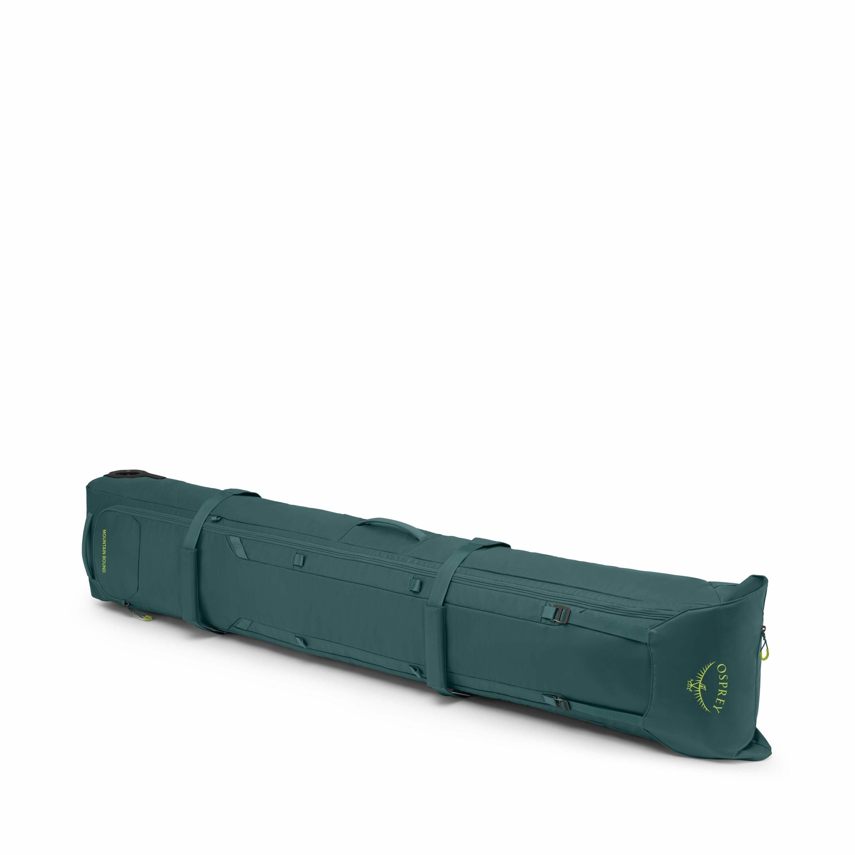 The image shows a large, elongated dark green bag, presumably designed for carrying skis, given its shape and size. The bag has a streamlined design with several pockets and straps, indicating that it has been crafted for both functionality and convenienc