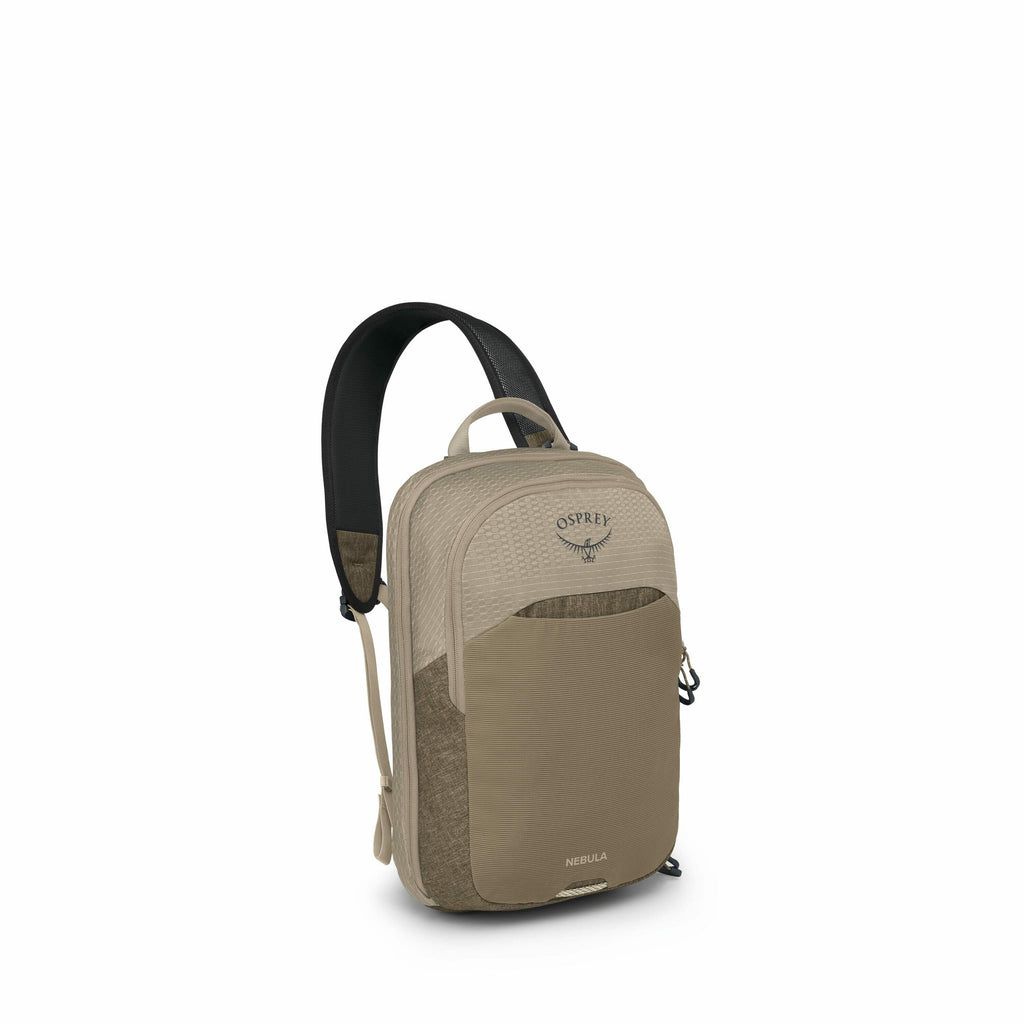 The image features a tan and brown backpack, specifically from the Osprey brand, with the model name "Nebula" visible on the front pocket. The backpack has a smooth and sleek design, with a large main compartment and a smaller front pocket, both secured w