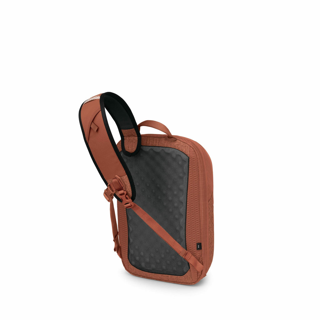 The image series depicts a backpack shown from various angles and in a deconstructed manner. The backpack is a reddish-brown color with black accents, featuring one main strap for carrying. Its back panel has a textured design and appears to be made of a