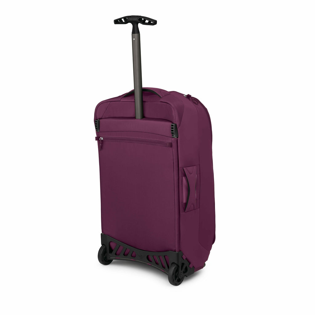 The image depicts a rolling luggage bag with a telescopic handle extended. The luggage is a deep burgundy color and features two wheels at the bottom for easy maneuvering. There is a large zippered pocket on the front of the bag, likely intended for addit