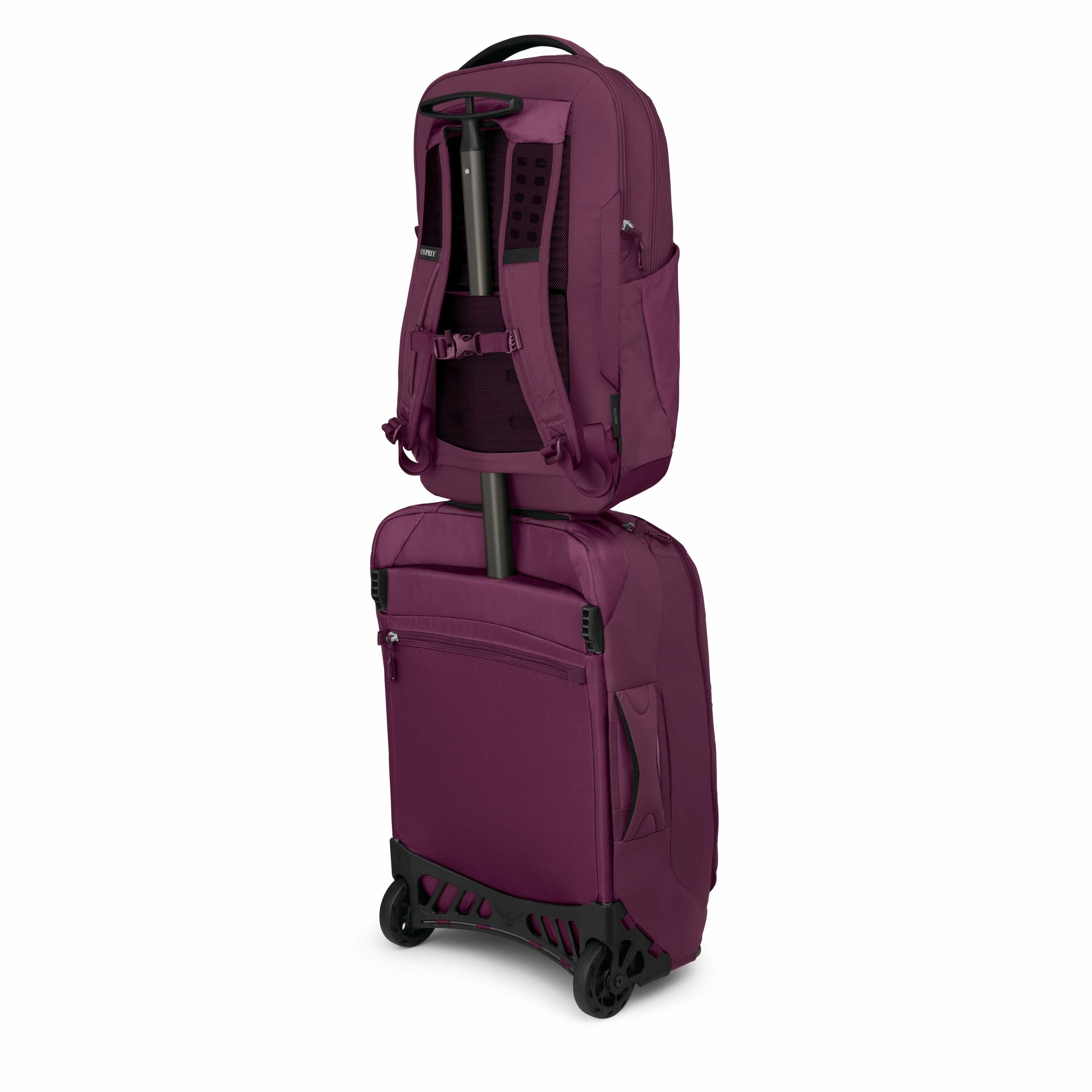 The image depicts a maroon-colored travel luggage system, consisting of a wheeled suitcase with a handle and a detachable backpack securely attached on top. The backpack features adjustable shoulder straps and is designed to sit on the handle of the suitc