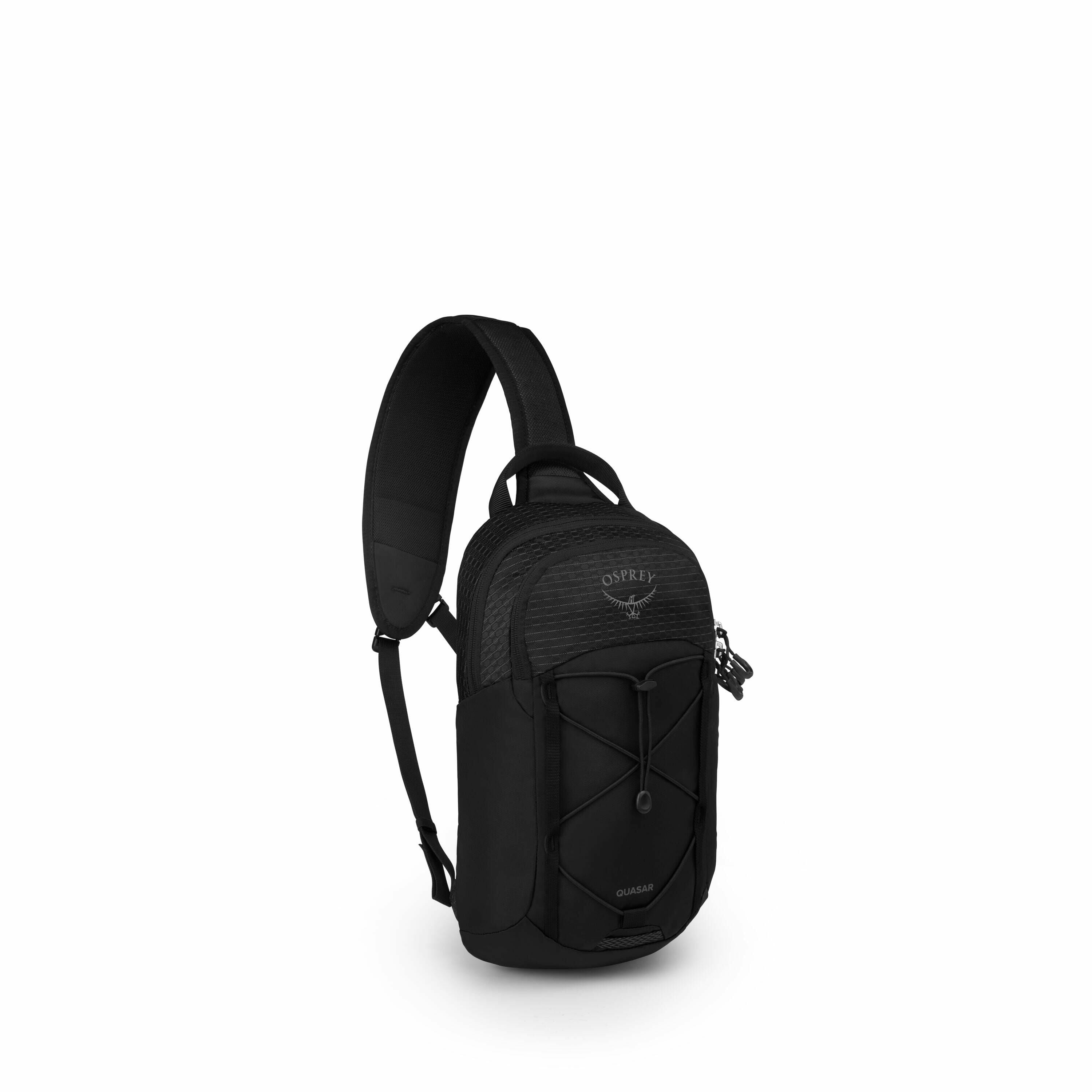The image depicts a black sling backpack from the brand Osprey, specifically the Quasar model. The bag features a single padded shoulder strap designed for comfortable cross-body wear. It includes several organizational elements such as a main compartment
