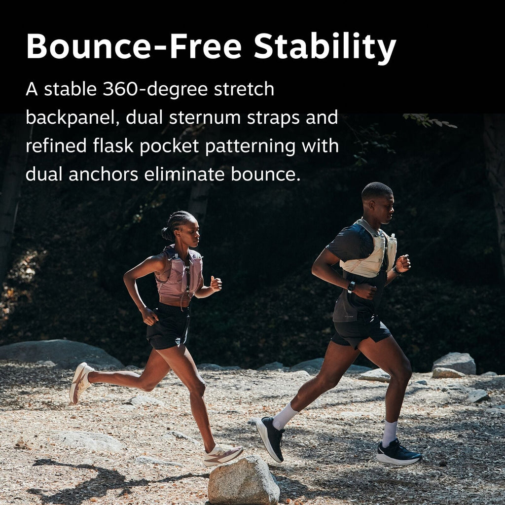 The image shows two athletic individuals running outdoors on a rocky path surrounded by trees. They are wearing running gear, including shorts, T-shirts, and specialized backpacks designed to minimize bounce. The text above them highlights the features of