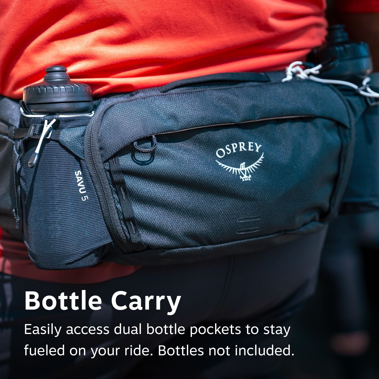 The image features a close-up of an Osprey branded waist pack, specifically the "Savu 5" model, worn by a person in a red shirt. The pack is equipped with dual bottle pockets on either side, each holding a black water bottle. The logo of Osprey is visible