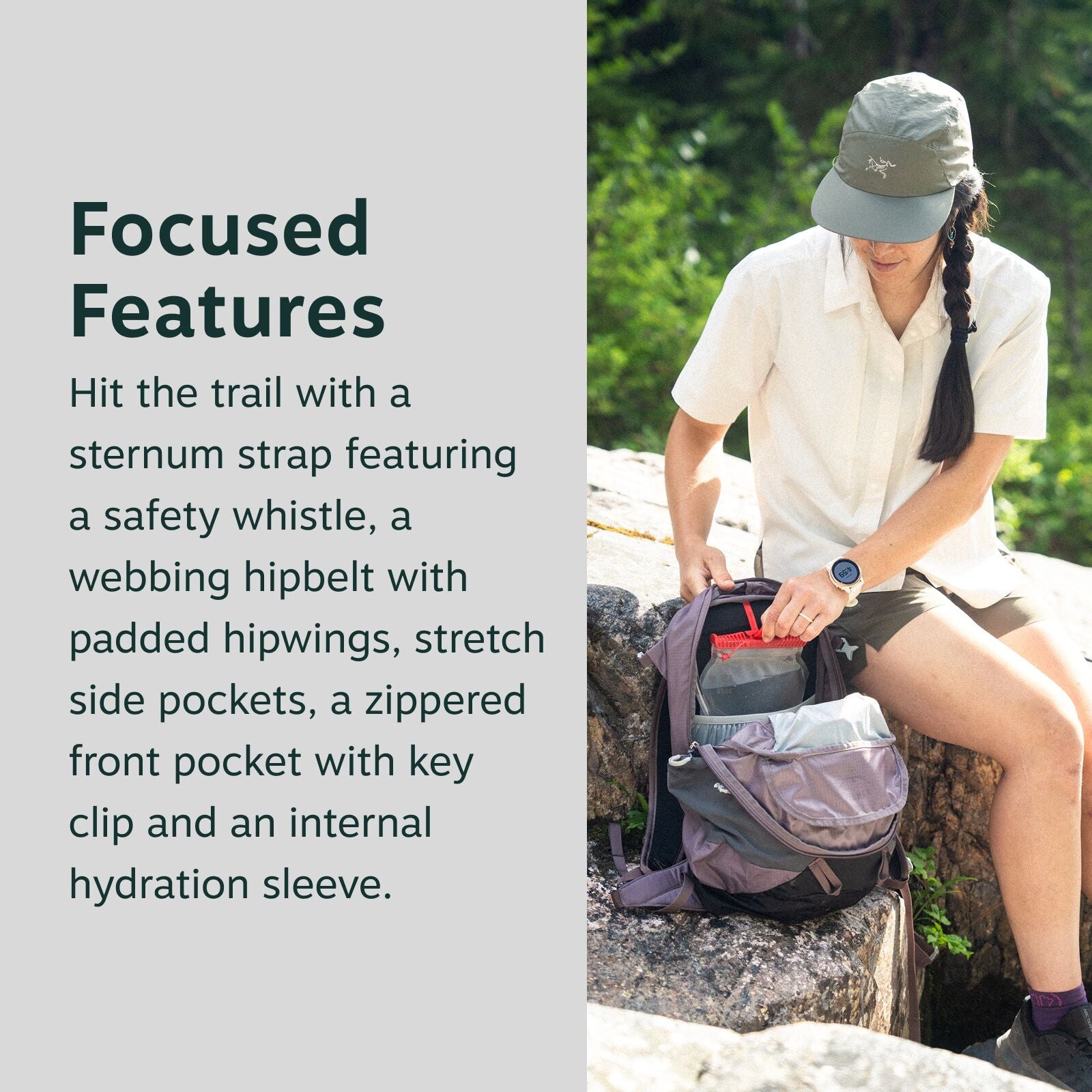 The image features an outdoor scene with a person dressed in hiking attire sitting on a large rock. They are wearing a light-colored short-sleeve button-up shirt, khaki shorts, and a green hat. The person is opening or organizing a backpack that is equipp
