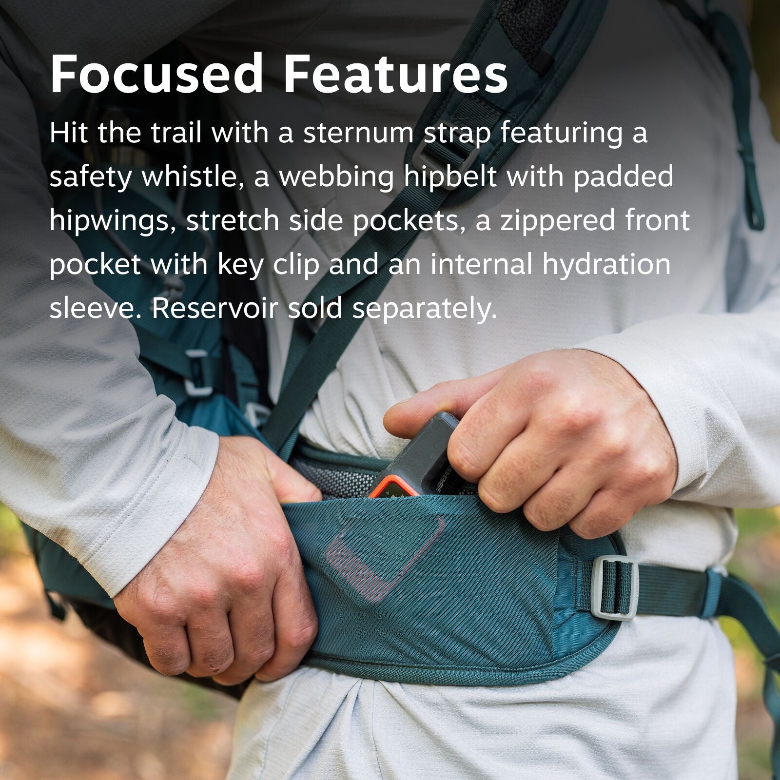 The image features a close-up view of a person wearing a backpack with a focus on the hipbelt area. The person's hands are adjusting or securing the backpack, revealing a zippered pocket on the hipbelt. This pocket holds a visible tool or accessory with a