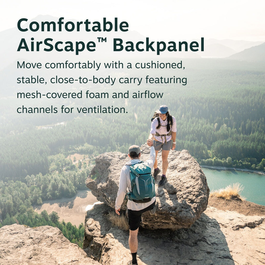 The image features a scenic landscape with two hikers atop a rocky cliff overlooking a lush forest and a body of water. The foreground showcases a man wearing a blue backpack, identified by the text as featuring the AirScape? Backpanel, reaching out to he
