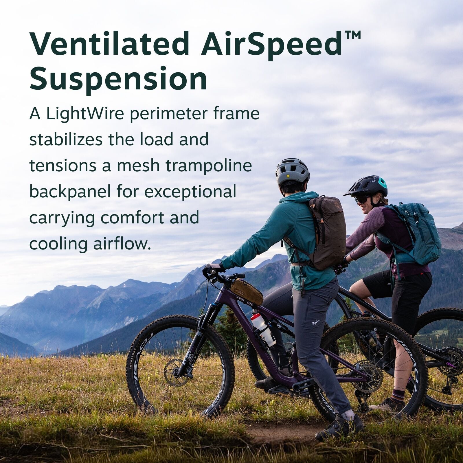 The image features two cyclists on a scenic mountain trail, both equipped with backpacks that likely incorporate the advertised Ventilated AirSpeed Suspension system. The cyclist on the left is wearing a teal jacket and grey pants, while the one on the ri