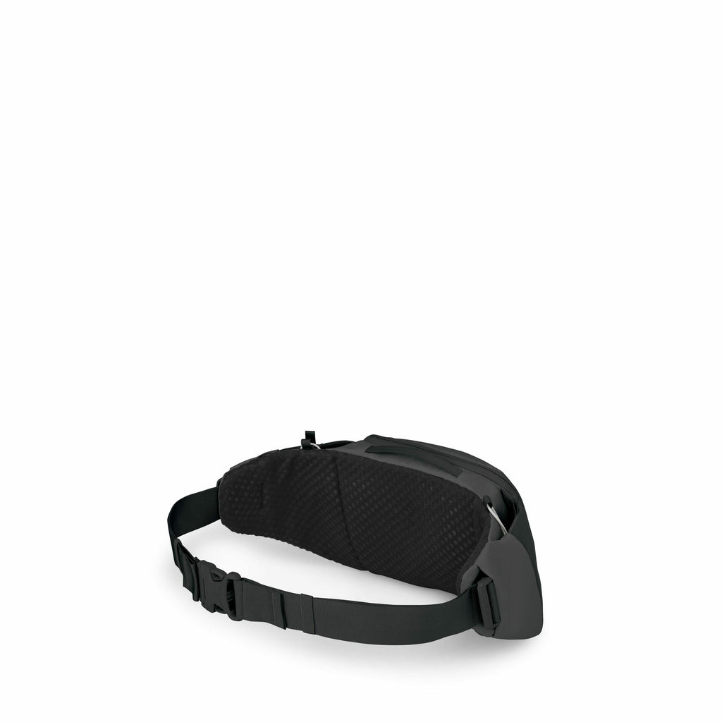 The image showcases a black waist bag, commonly known as a fanny pack, with an adjustable strap and buckle. The design of the bag includes a padded section that rests against the body for comfort. The bag appears to have a sleek and minimalist design, wit