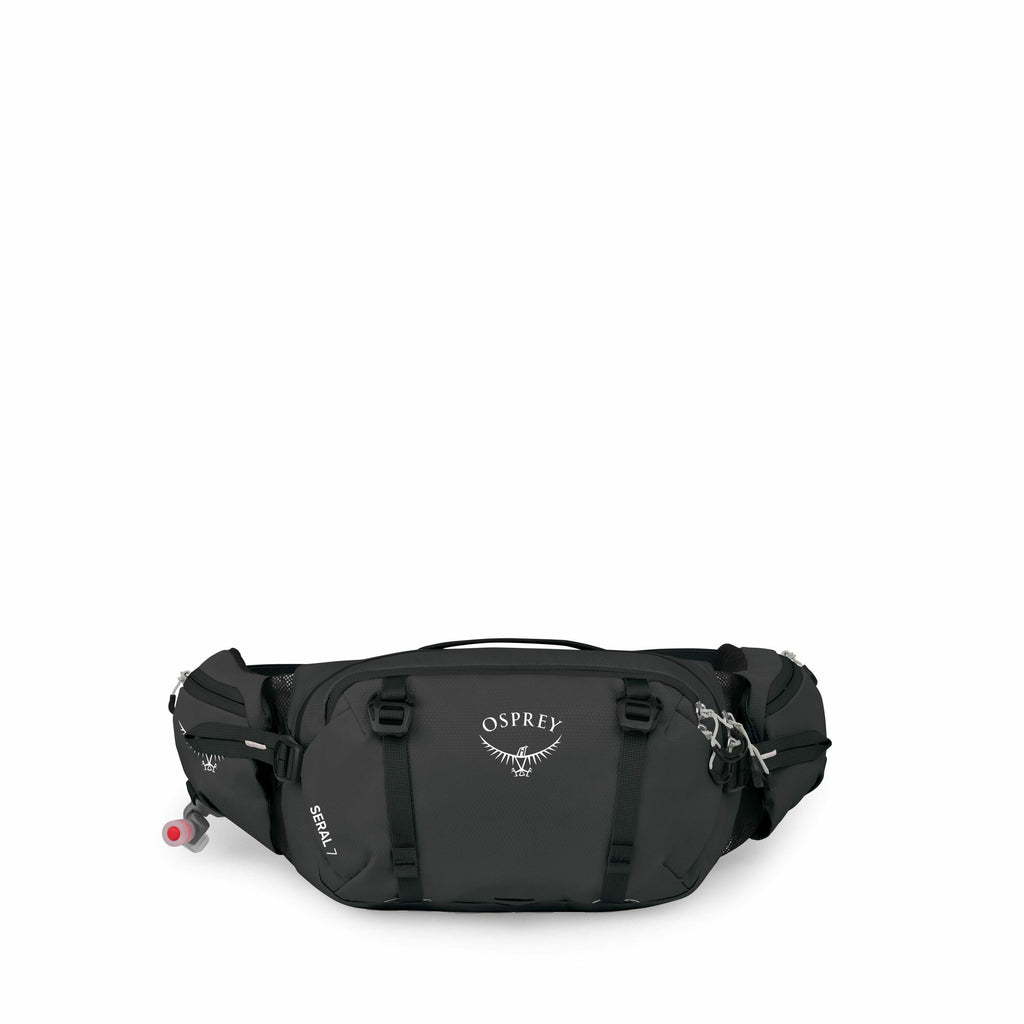 The image features a black Osprey Seral 7 waist pack, designed for outdoor and active use. It has the Osprey logo prominently displayed on the front along with the model name "SERAL 7". The pack includes multiple compartments with zippers, adjustable stra