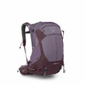 The image depicts a purple Osprey backpack with a sleek design. The backpack features multiple compartments and straps, including a front pouch and a padded hip belt for enhanced comfort and support. The Osprey logo, featuring a stylized bird motif, is pr