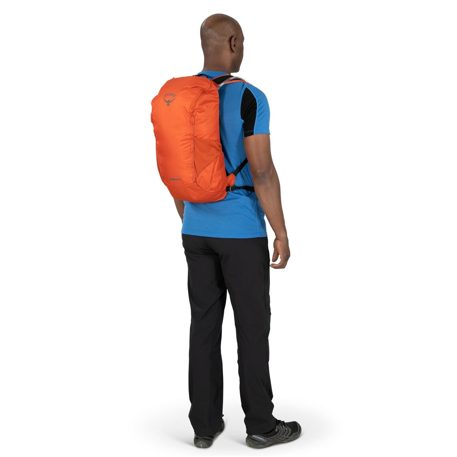 a person modeling the Skarab 18 in color firestarterorange