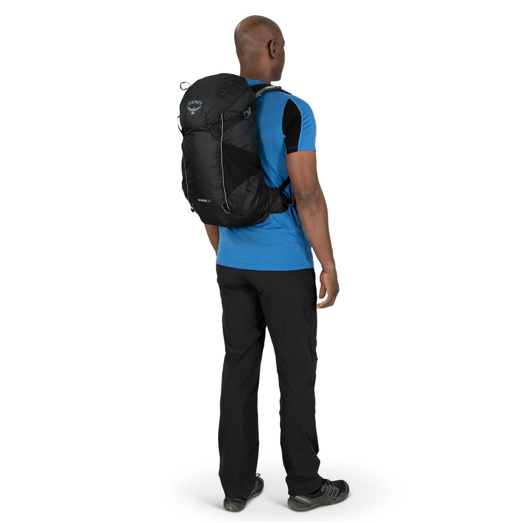 a person modeling the Skarab 22 in color black