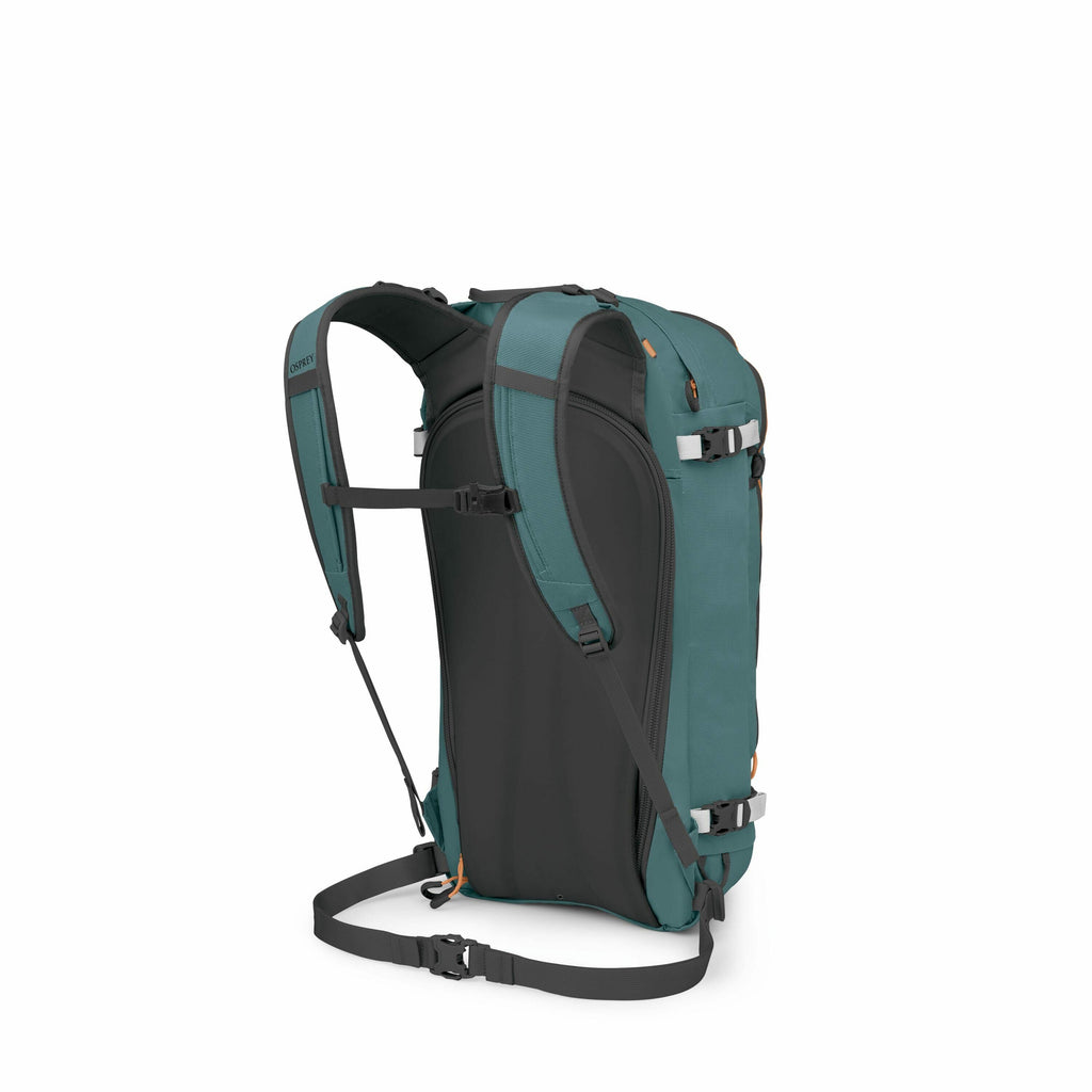 The image displays a teal-colored backpack from a rear view, showcasing its ergonomic design and features. The backpack appears to be built for outdoor activities, likely hiking or trekking, as indicated by the sturdy straps and supportive back panel. It