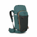 The image shows an Osprey backpack designed for outdoor activities such as hiking or climbing. It is primarily teal with black and orange accents, featuring various compartments and straps for securing gear. The design includes a prominent front pocket wi