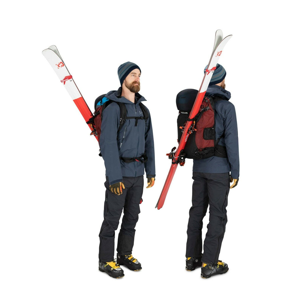 a person modeling the Soelden Pro 32 in color redmountain
