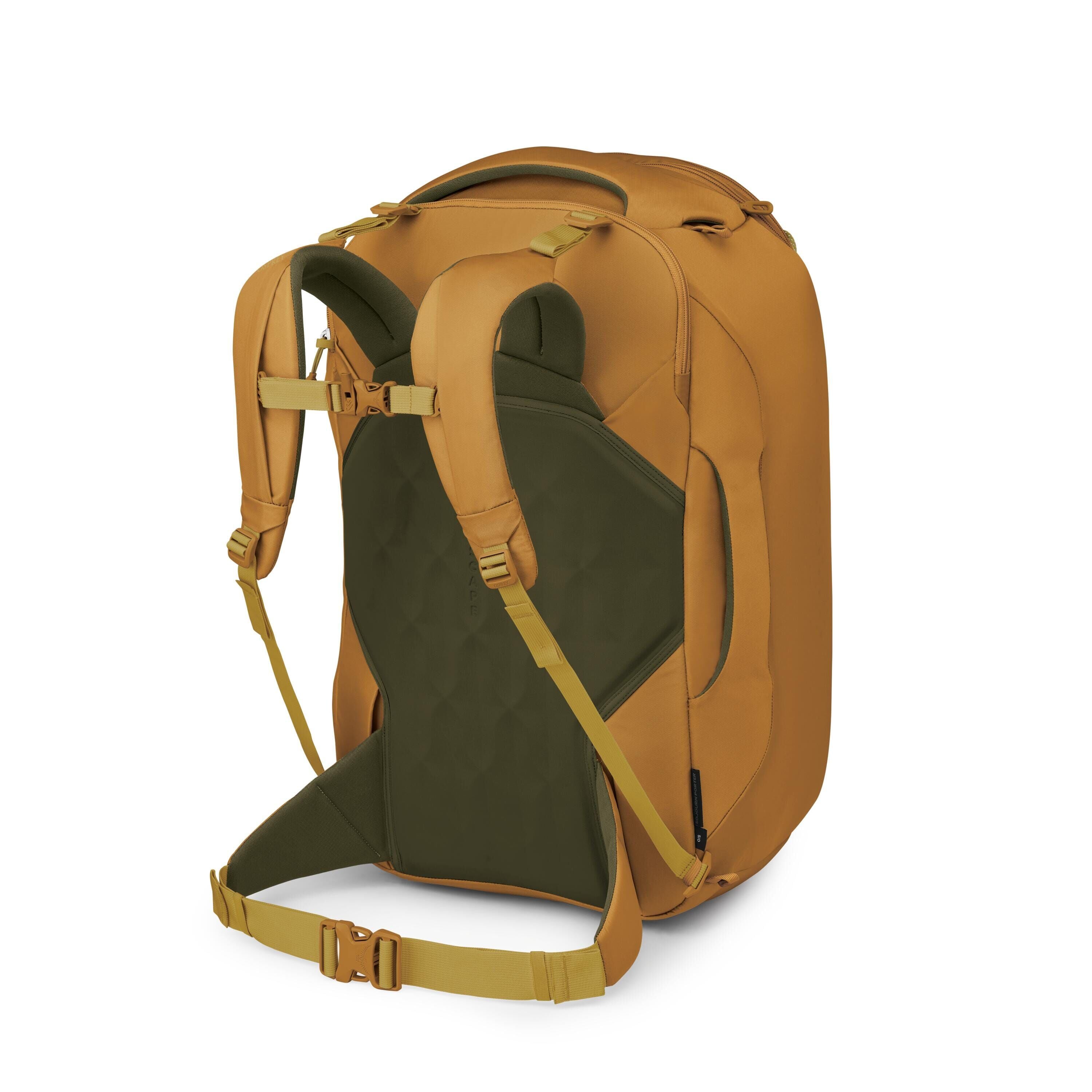 The image shows a travel backpack viewed from the back-right side. It has a mustard yellow exterior with dark olive green padded back panel and shoulder straps. There are multiple adjustment straps, including a sternum strap and a padded hip belt with a b