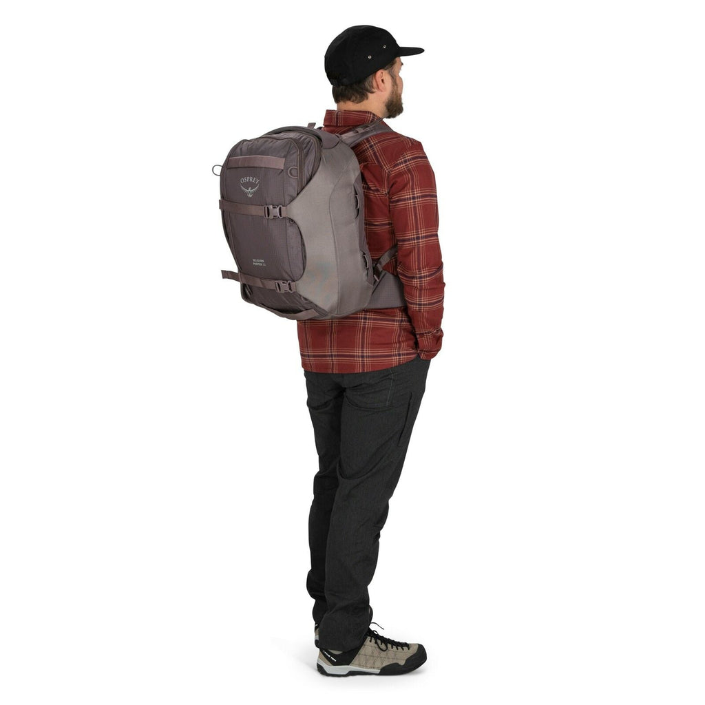 a person modeling the Sojourn Porter™ 30L in color Black