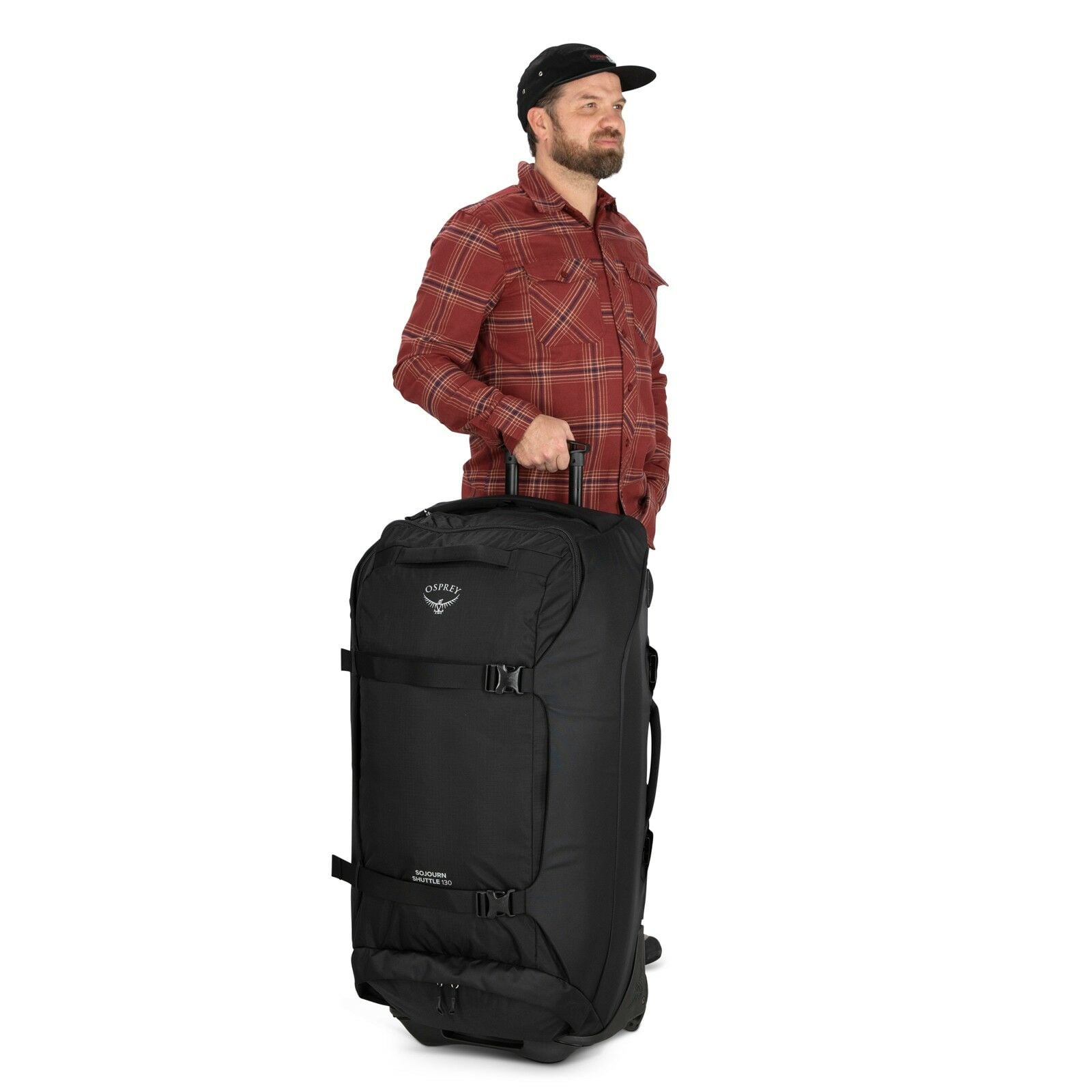 a person modeling the Sojourn™ Shuttle Wheeled Duffel 36"/130L in color Black