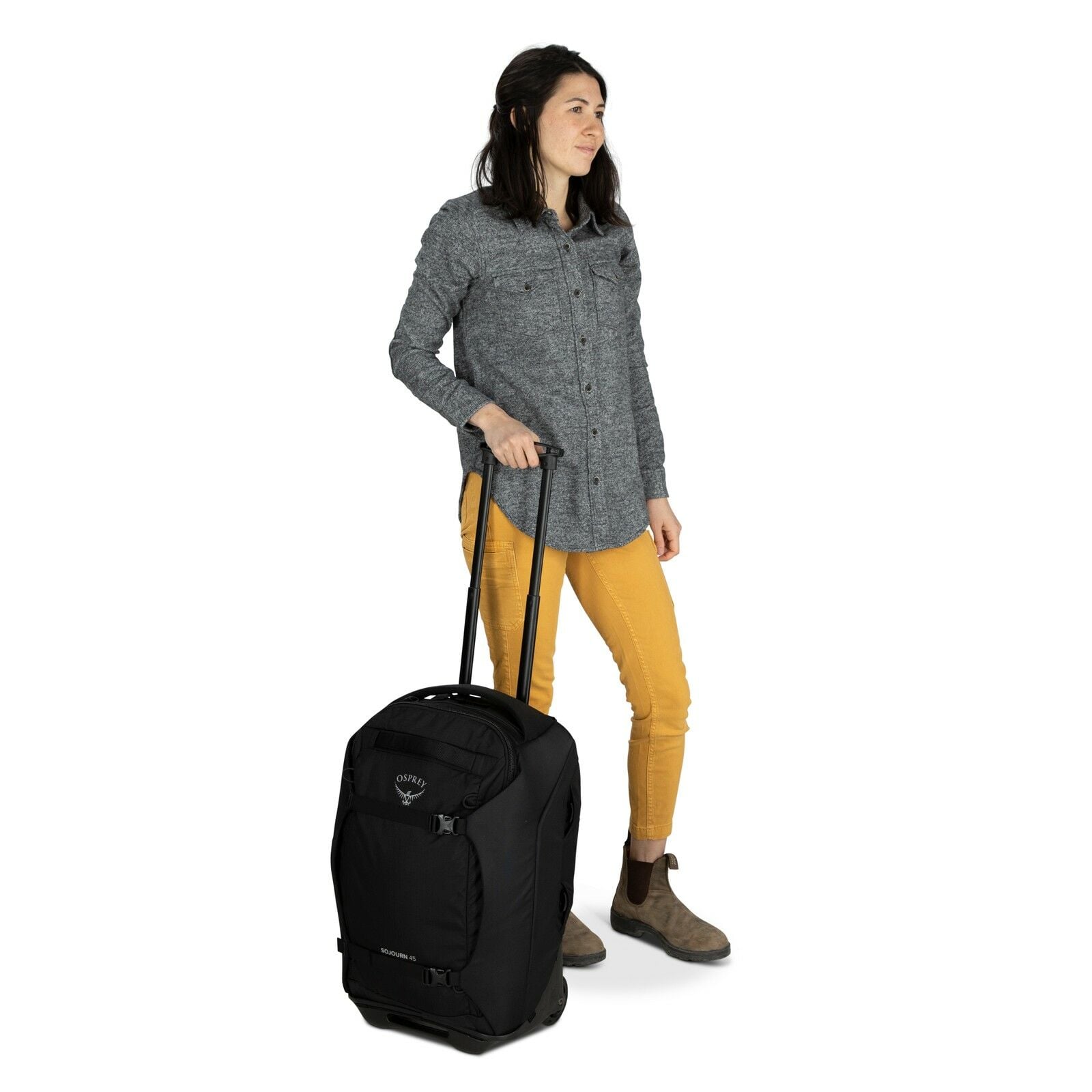 a person modeling the Sojourn™ Wheeled Travel Pack 22"/45L in color Black