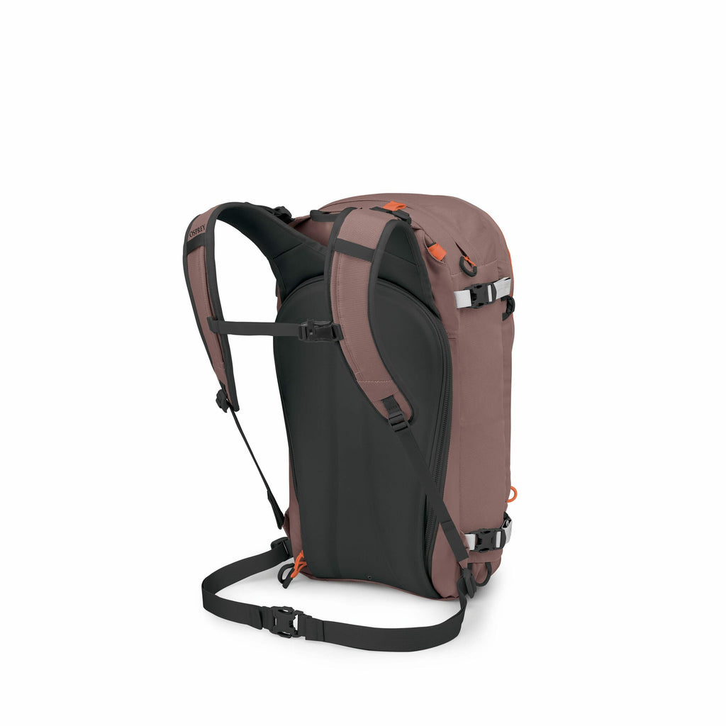 The image shows a backpack that appears to be modular, with various sections and components displayed separately. The backpack has a main body with a brownish color and black back padding for comfort. The straps are adjustable and seem to be designed for