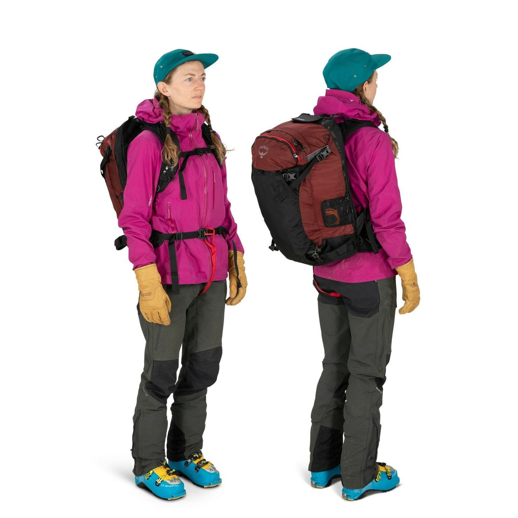 a person modeling the Sopris Pro 30 in color Red Mountain