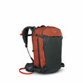 The images show a backpack designed for outdoor activities, likely hiking or mountaineering. The main color of the backpack is a dark slate gray, with contrasting bright orange sections on the top and some of the straps, which are adjustable. The backpack