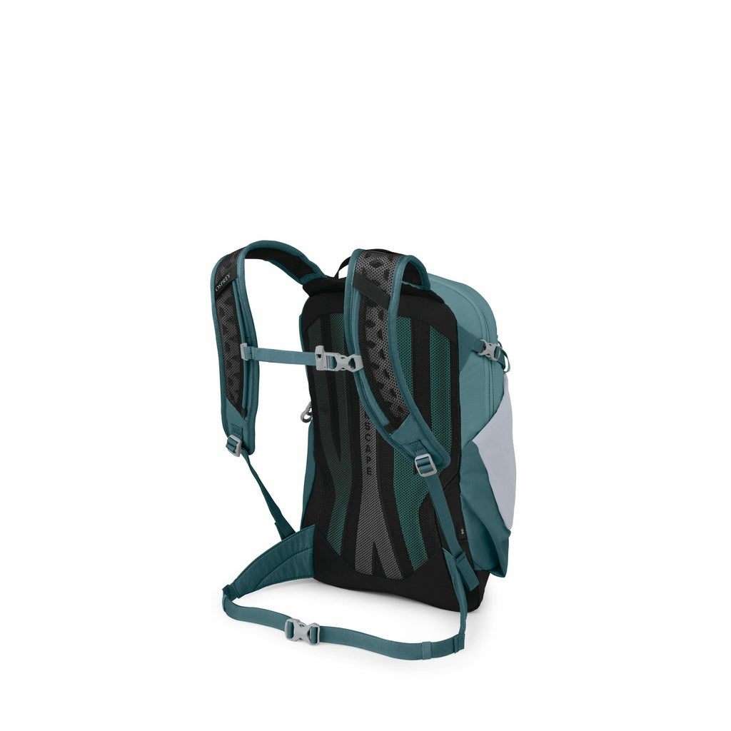 The image features a teal-colored backpack with an ergonomic design, viewed from the back and slightly to the side. It has padded shoulder straps and a padded back panel for comfort, with mesh material for ventilation. There's a sternum strap and a waist