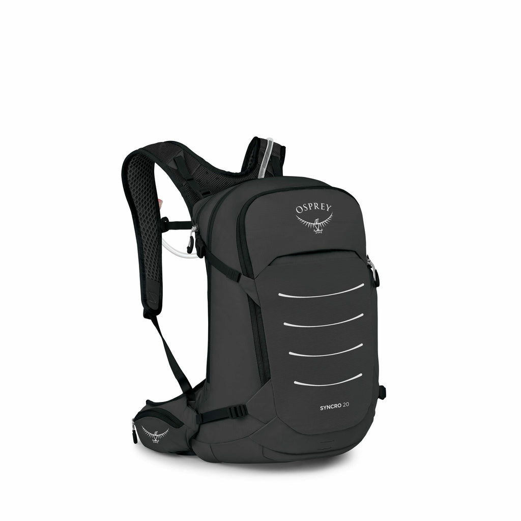 The image features a black Osprey Syncro 20 backpack. The backpack has a sleek and compact design with a main compartment and a front panel that has several horizontal reflective lines for visibility. It also has a prominent Osprey logo at the top, which