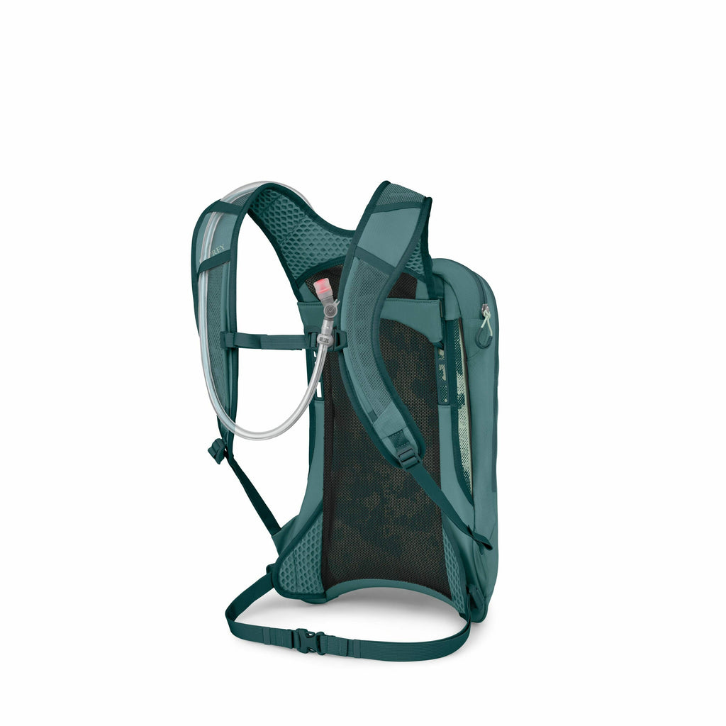The image depicts a dark green backpack with a hydration system, viewed from an angle that shows its back and side. The backpack features two padded shoulder straps connected by a chest strap, and a waist strap for added support. A transparent tube is vis