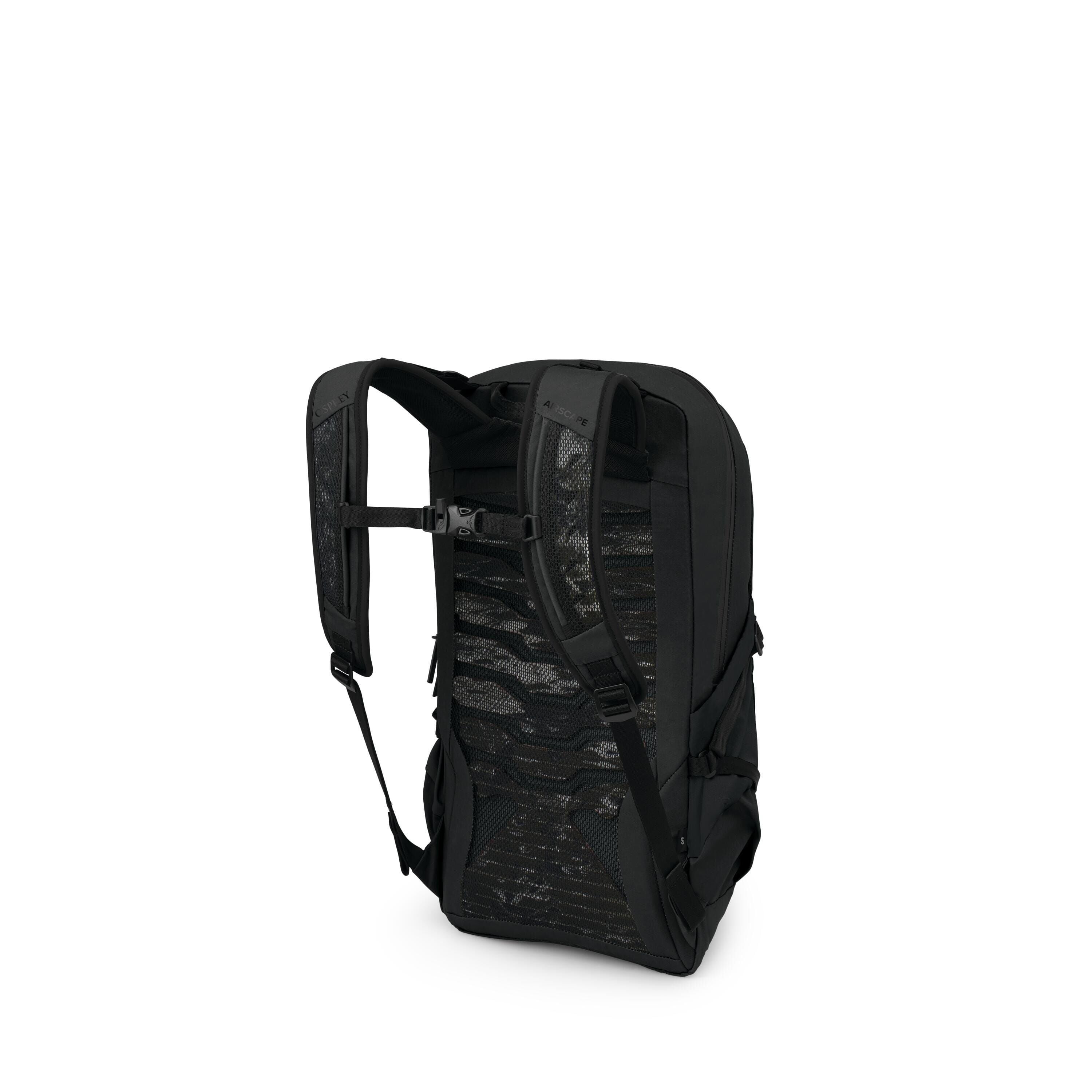 The image shows a black backpack photographed from the back-left angle. It has padded shoulder straps with an adjustable sternum strap and a ventilated mesh back panel featuring wavy cutouts. The pack has a streamlined, rectangular shape with side compres
