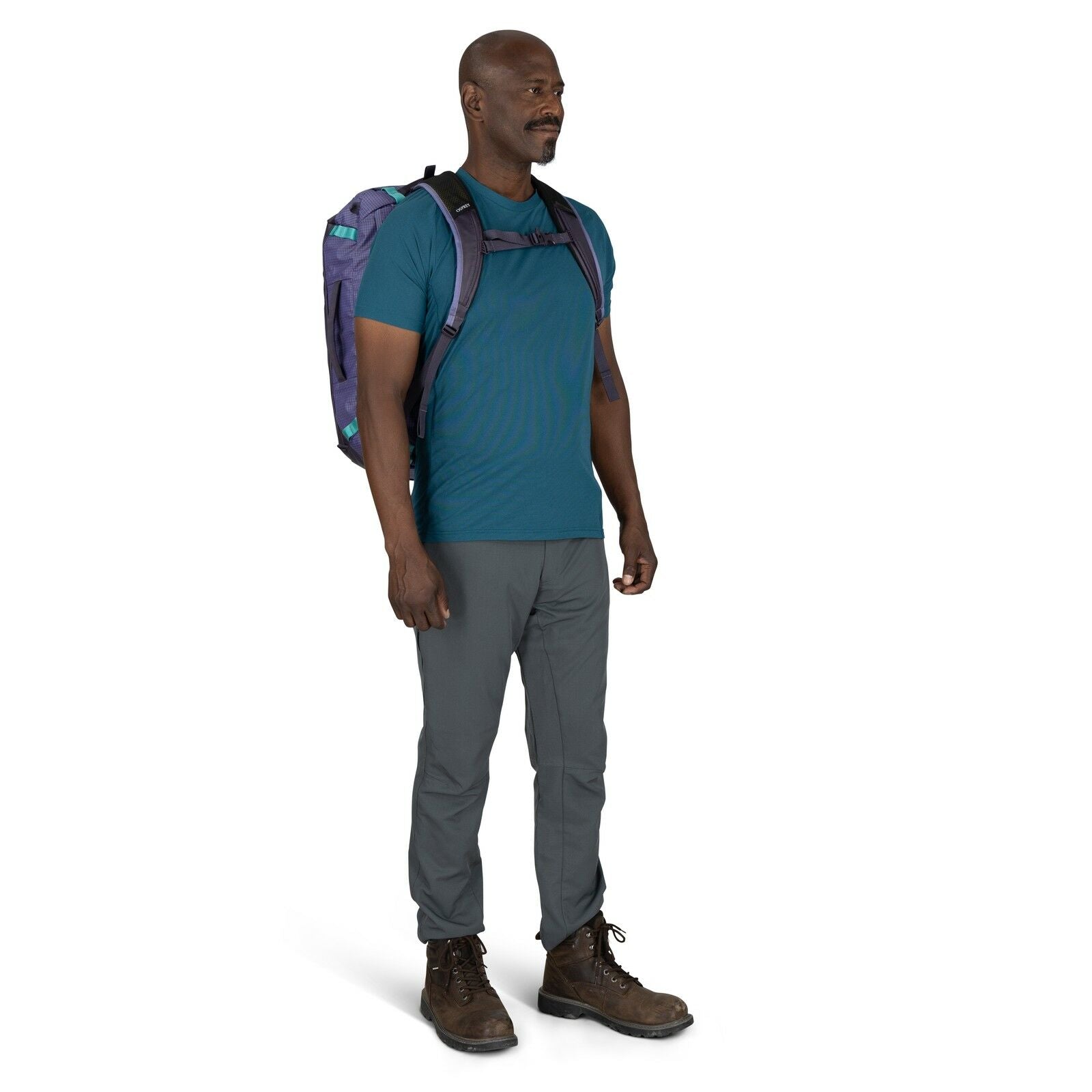 Image of model wearing the Transporter Duffel 40 in the color Euphoria Purple / Purple Ink