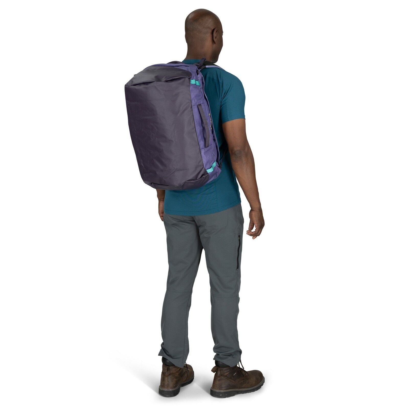 Image of model wearing the Transporter Duffel 40 in the color Euphoria Purple / Purple Ink