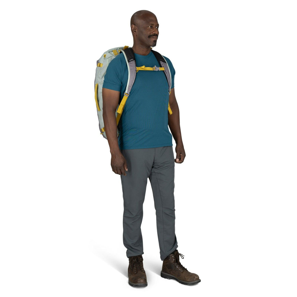 Image of modal wearing the Transporter Duffel 65 in the color Frosty Mint