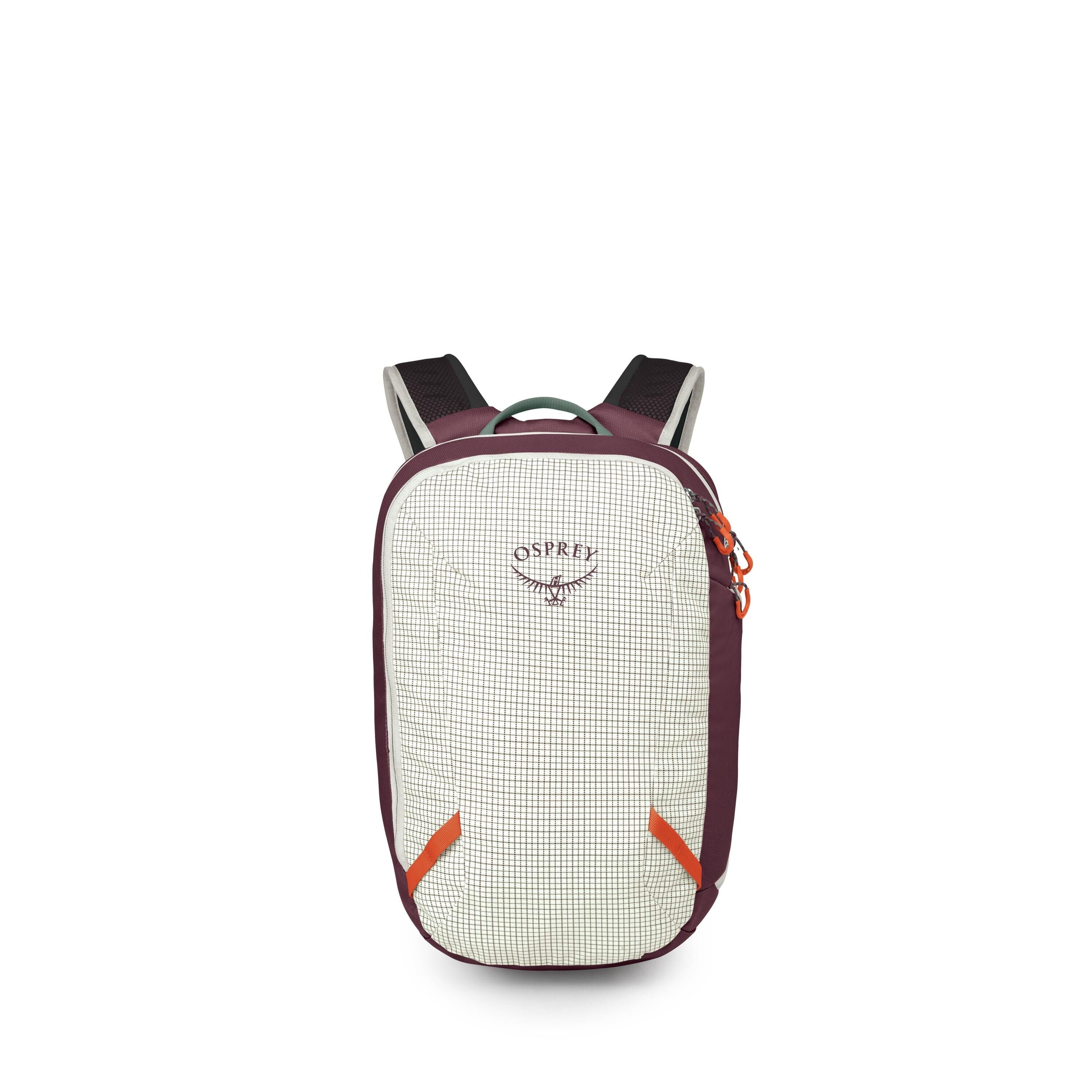 A compact Osprey backpack is shown upright against a white background. The pack has a light grid-patterned front panel with the Osprey logo, bordered by deep purple sides and base. Bright orange zipper pulls and small front accent tabs add contrast, while