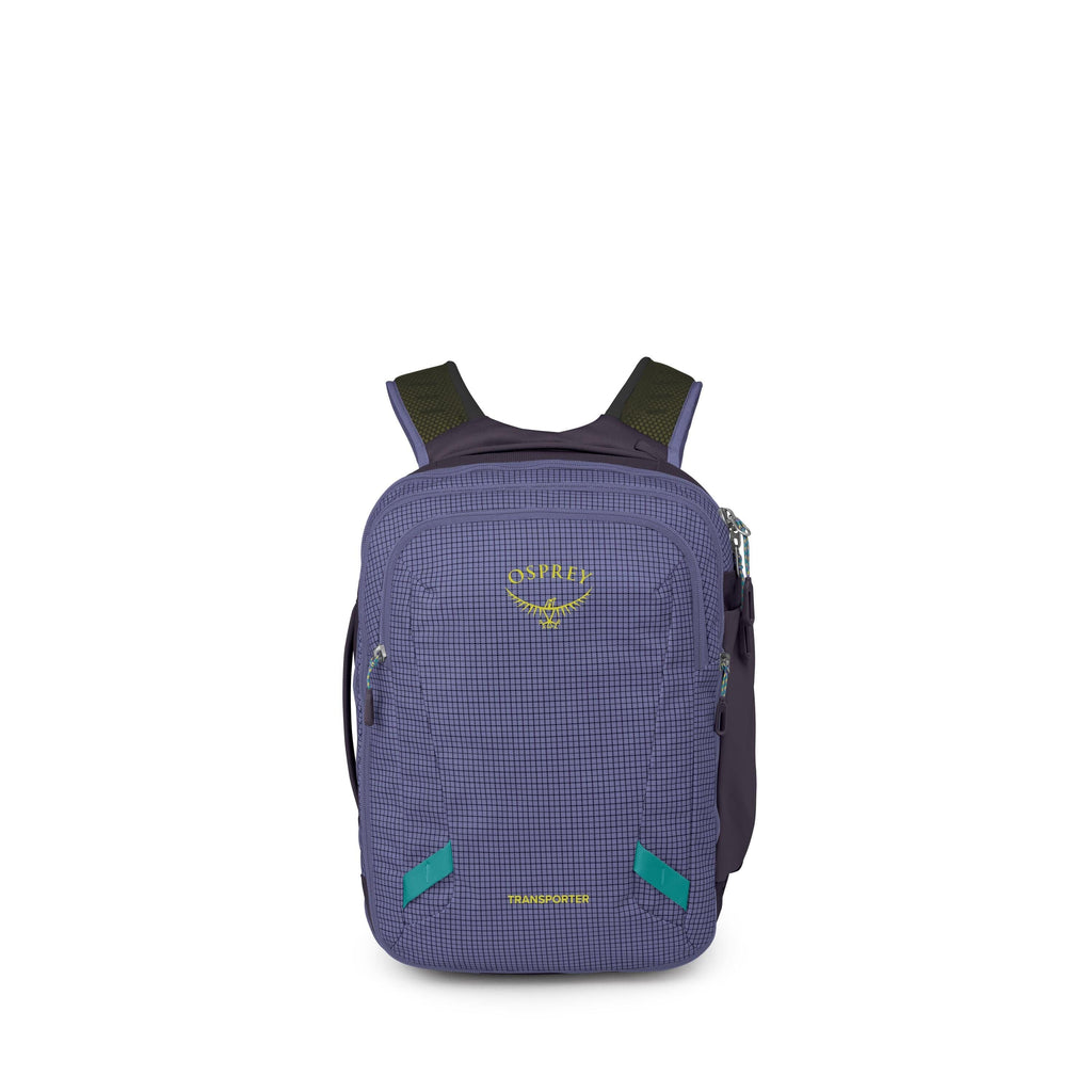 A compact Osprey backpack is shown standing upright against a white background. It has a blue grid-patterned front panel with the yellow Osprey logo and the word "Transporter" near the bottom. The pack features two front zip compartments, side zips, and p