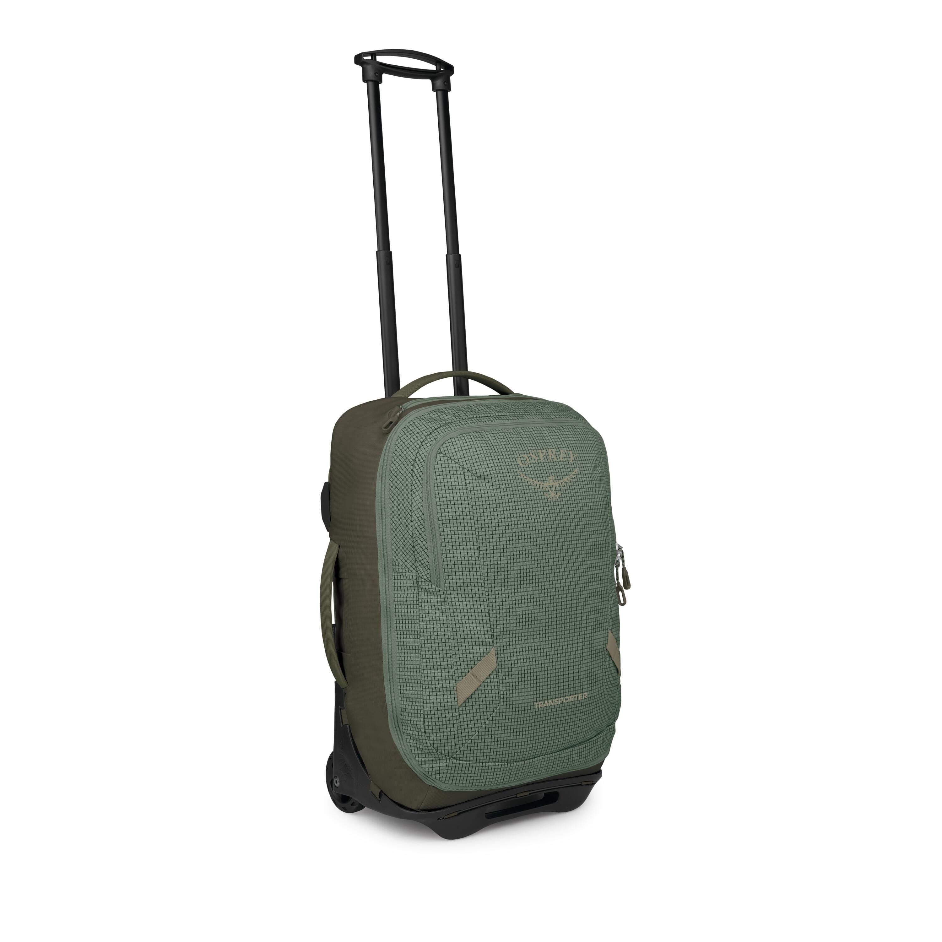 The images show a compact rolling travel bag in green with a subtle grid pattern. It features a telescoping handle, two wheels, and multiple grab handles on the top and side for easy carrying. The front has a zippered pocket with small reflective tabs and