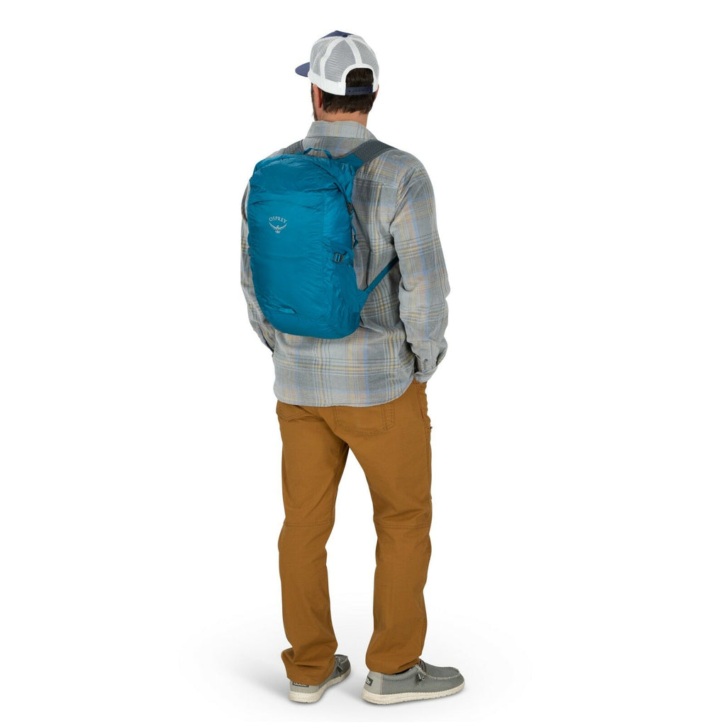 a person modeling the Ultralight Dry Stuff Pack in color Black