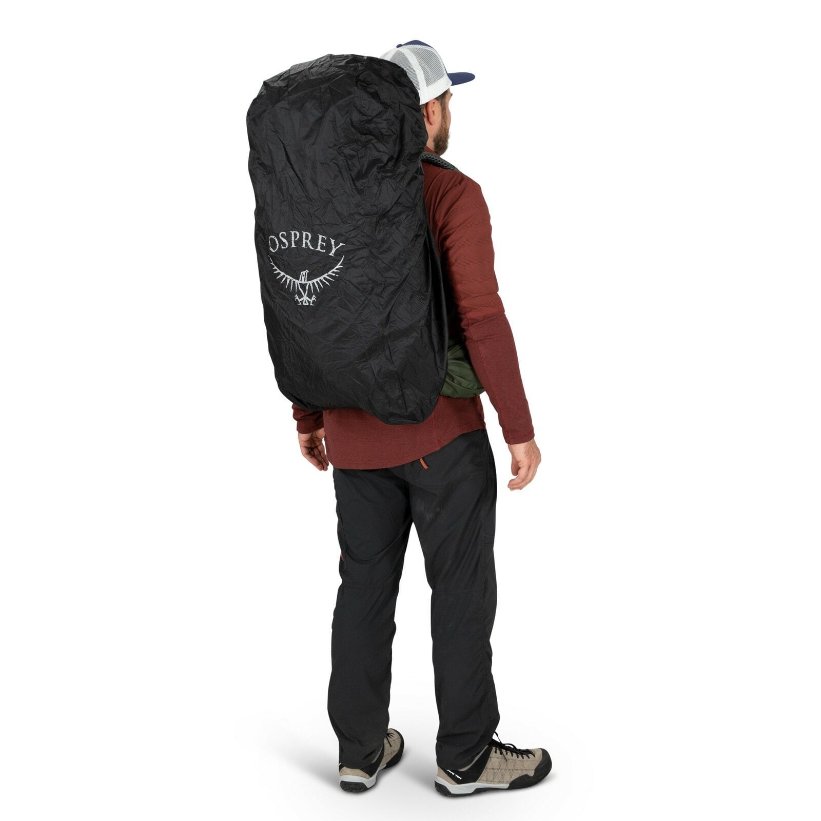 a person modeling the Ultralight Raincover Medium in color black