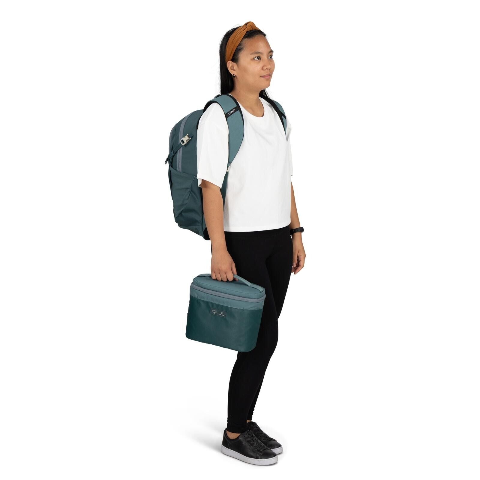 Image of model wearing the Osprey Hydro Flask Axis Lunch Bag in the color Cascade Blue-Torrent Blue