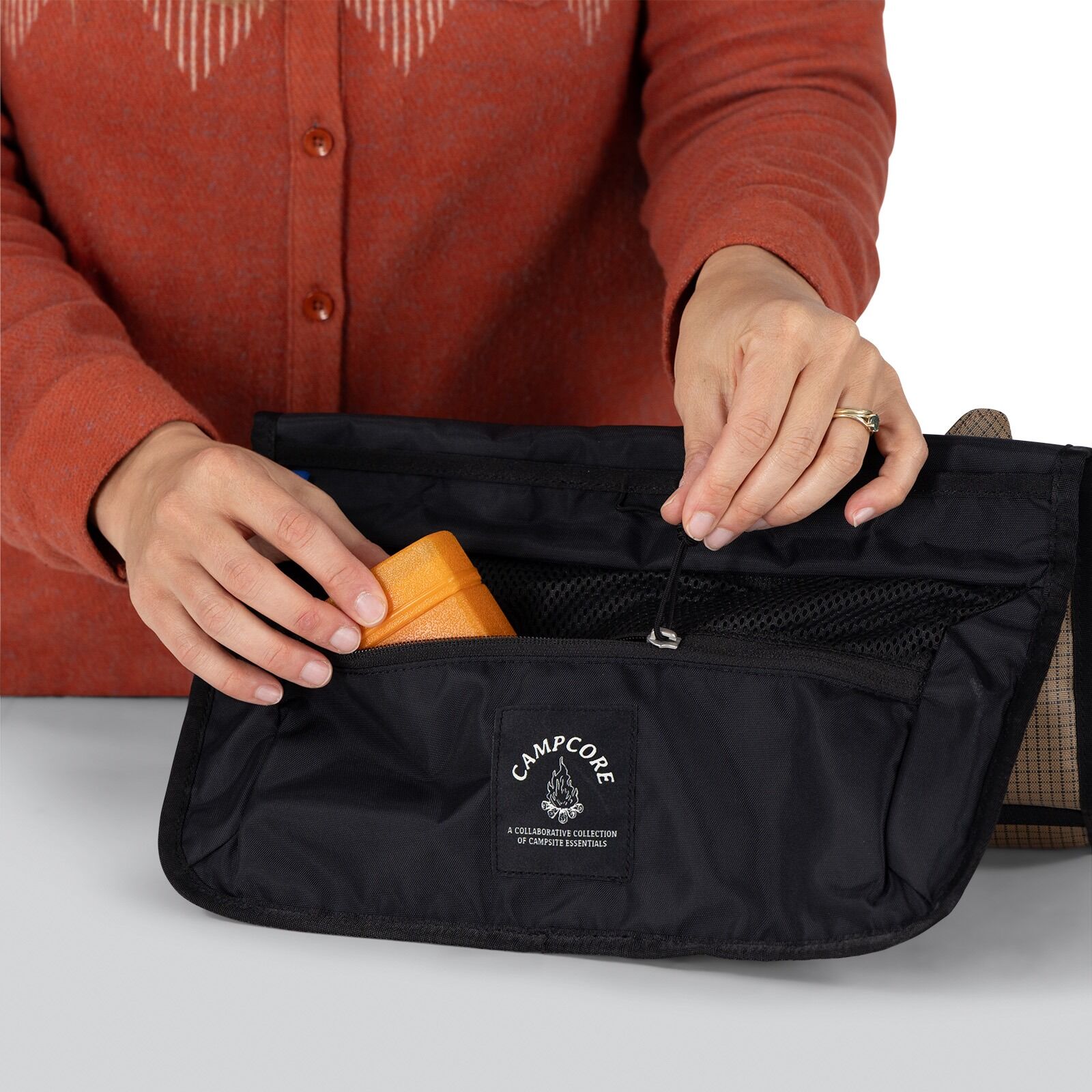 detailed image of the Oxo Campcore cooking tool roll and utensil set