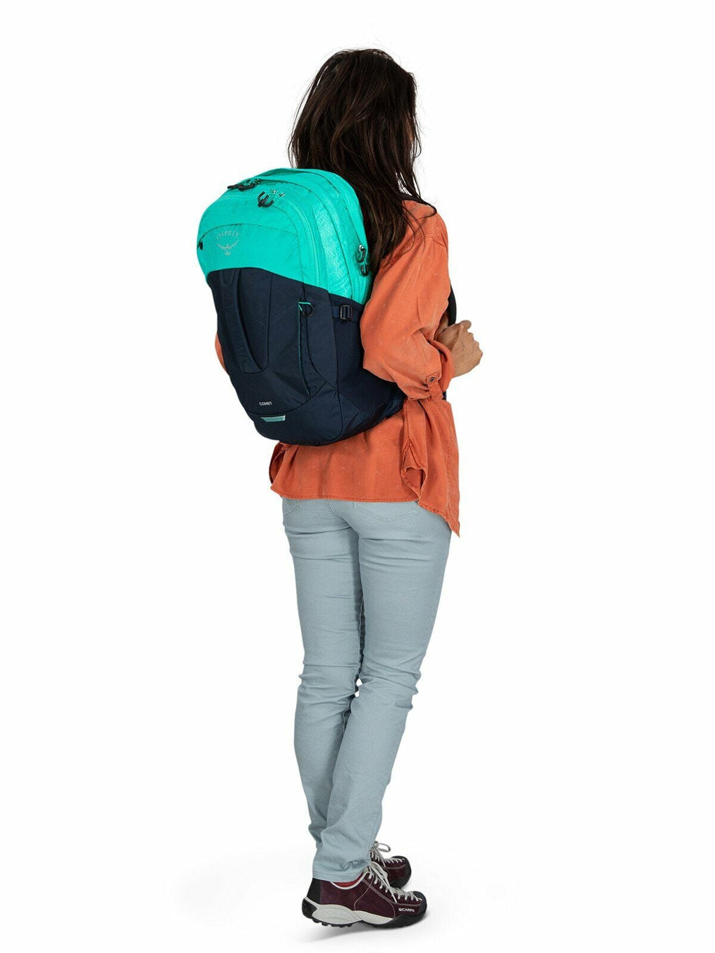 a person modeling the Comet 30 in color reveriegreencetaceanblue