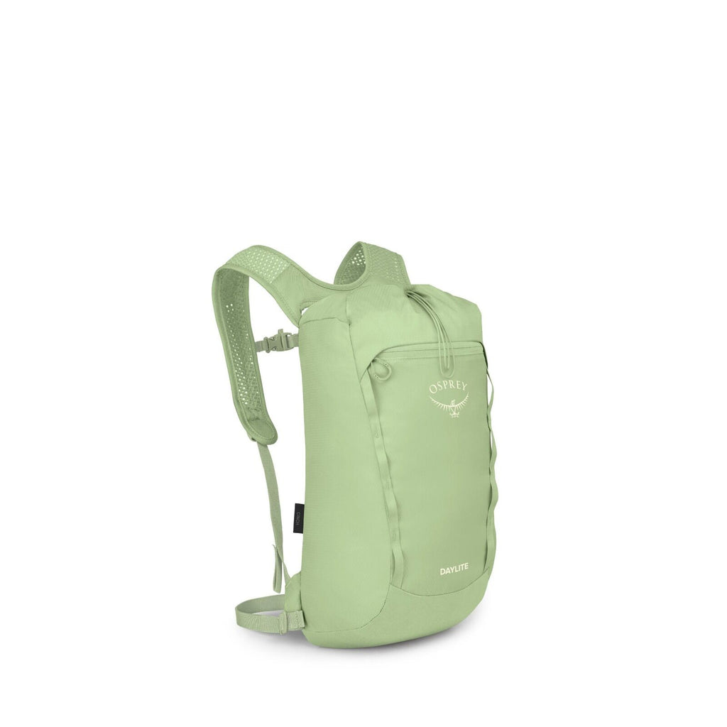 A compact, light green Osprey Daylite backpack is shown against a white background. It has a streamlined shape with a front zip pocket, top zipper, and subtle lash points along the sides. The mesh shoulder straps and small hip strap suggest it's designed