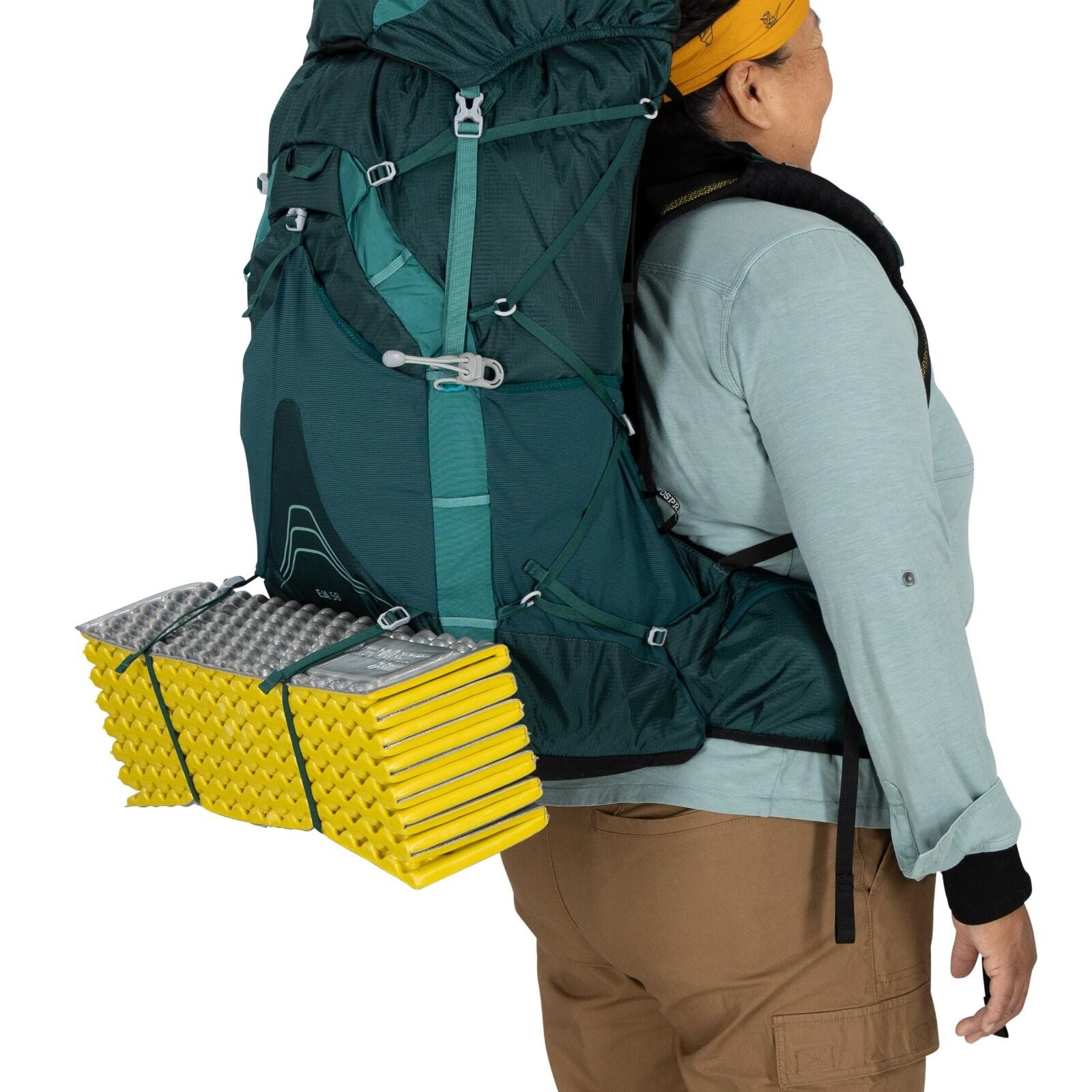 model wearing the Eja 58 Extended Fit in color Deep Teal
