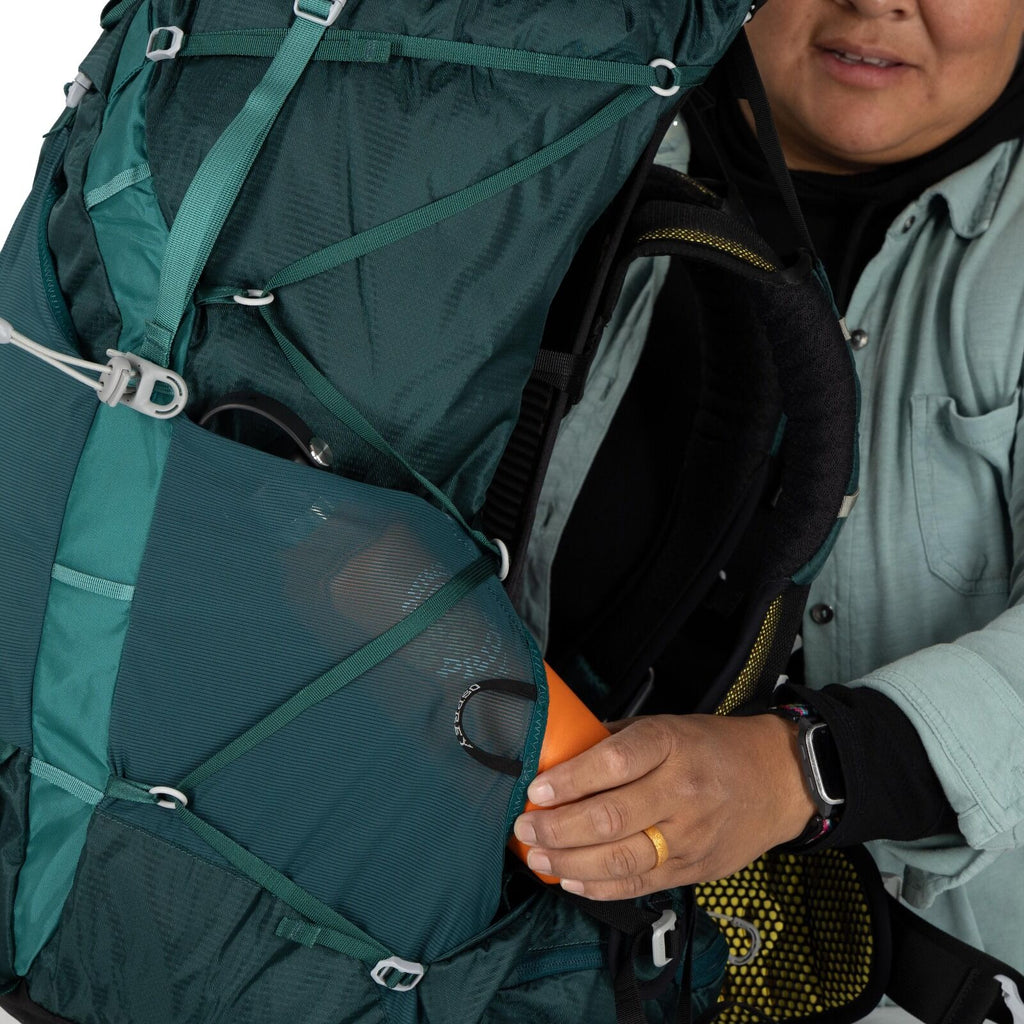 model wearing the Eja 58 Extended Fit in color Deep Teal