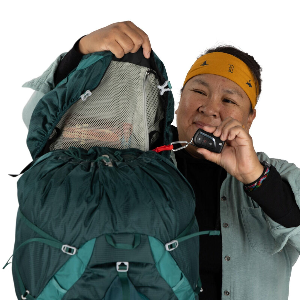 model wearing the Eja 58 Extended Fit in color Deep Teal