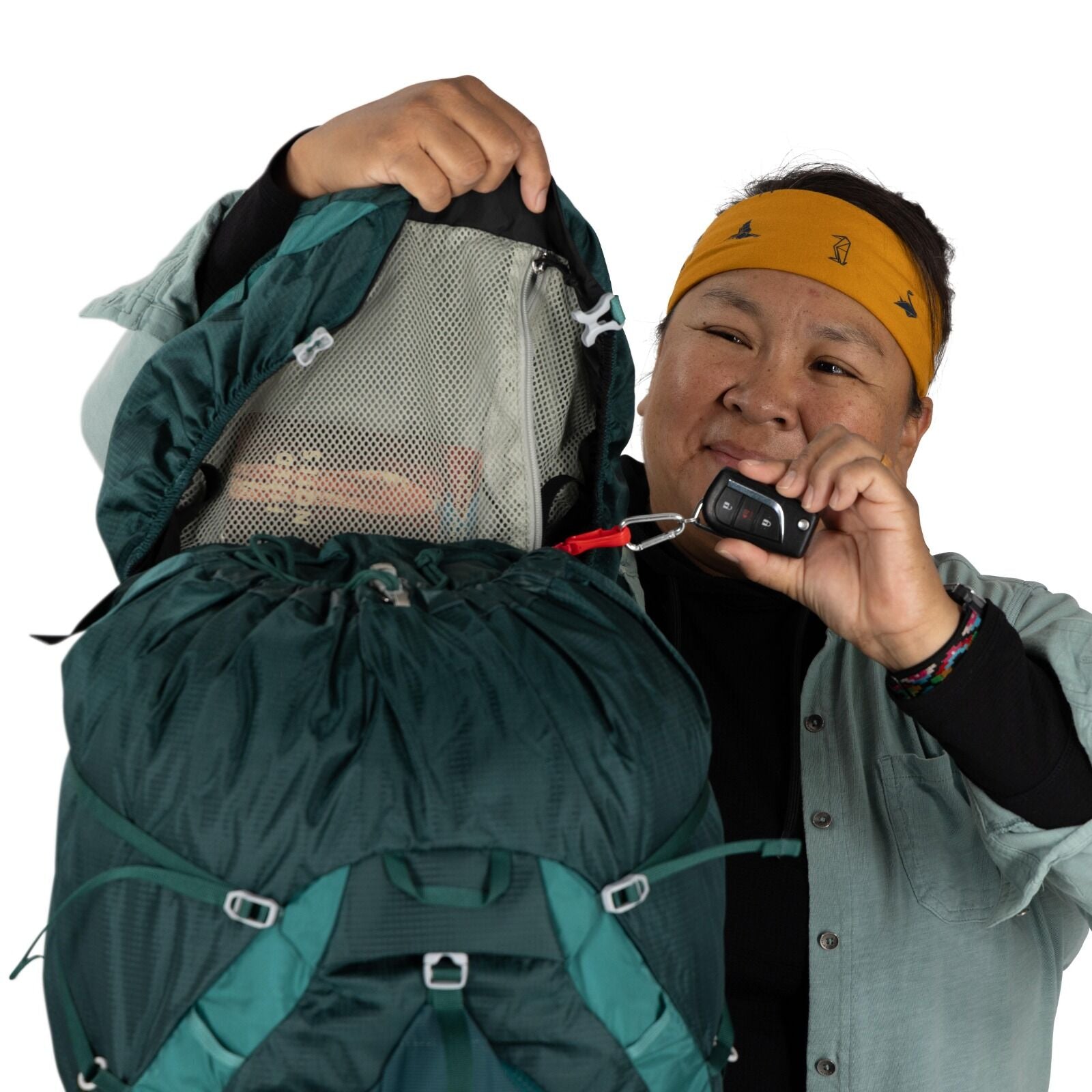 model wearing the Eja 58 Extended Fit in color Deep Teal